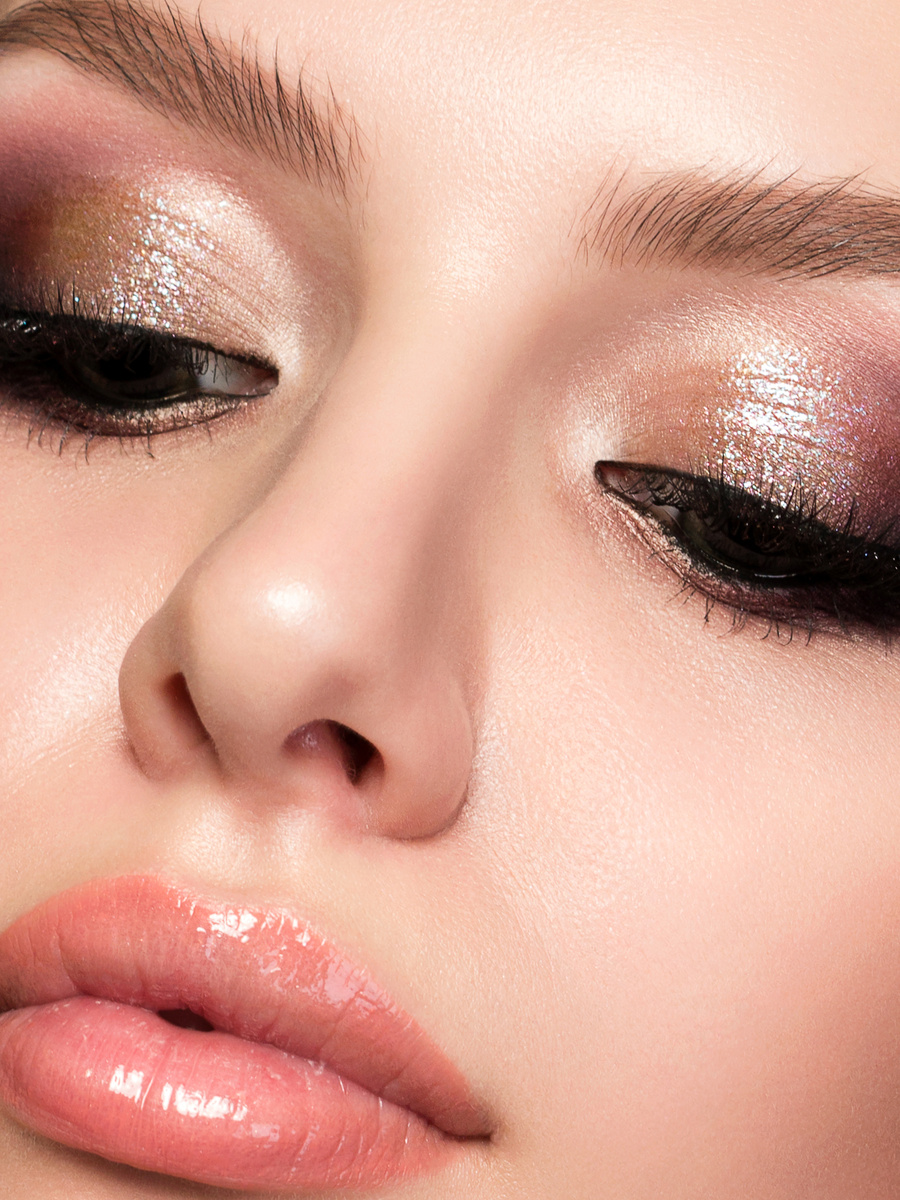 Young Beautiful Woman with Evening Make up